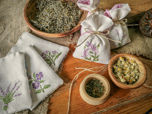 https://www.moth-prevention.com/cdn/shop/files/sachets_being_made_from_dried_flowers_including_lavender.jpg?v=1685561104&width=512